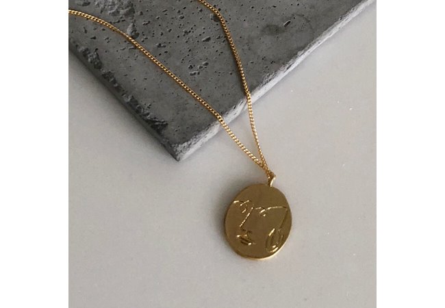 face gold necklace